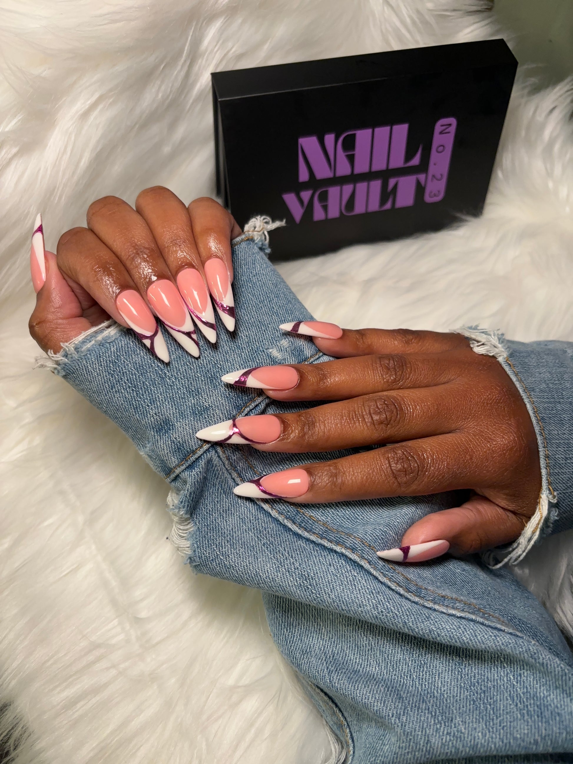 stiletto White French tip press-on nails featuring pink isolated chrome abstract accents. A modern twist on the classic French manicure with a sleek, high-gloss finish. Hand-painted on 100% Gel X tips for a salon-quality, reusable finish.