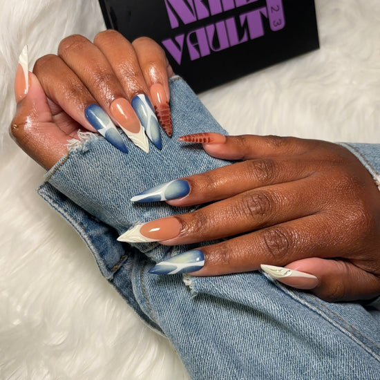 Multi-design press-on nail set featuring brown blooming gel, blue & white aura airbrush with abstract accents, and classic white French tips with 3D jelly details. Each nail is hand-painted on 100% Gel X tips for a salon-quality, reusable finish. Available in Square, Stiletto, Ballerina, and Coffin shapes