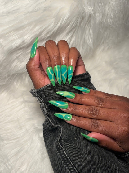 Green airbrush stiletto nails, turquoise blue aura stiletto press-ons, extra long gel nails, trendy handmade press-ons, bold nail designs, reusable luxury press-ons, salon-quality aura nails, fashionable long stiletto press-ons