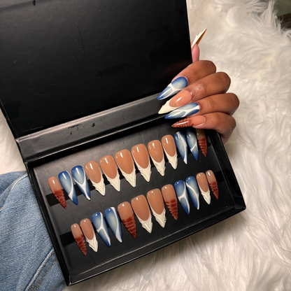 Multi-design press-on nail set featuring brown blooming gel, blue aura airbrush, white aura airbrush, abstract nail, classic white French tips, Makartt 3D jelly details Stiletto shape ,Gel X Press on naisls